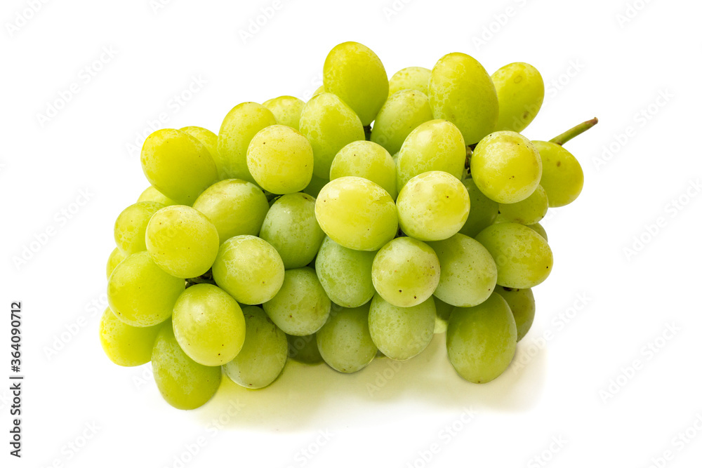 Ripe green grapes on a branch isolated on white background