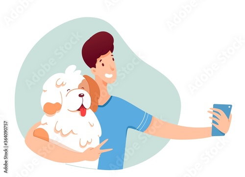 Young guy making selfie with his dog