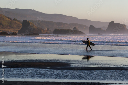 Surfing in the Oregon coast photo