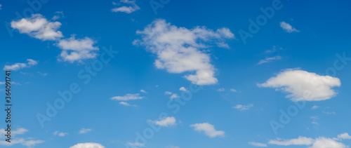 Background with blue fluffy sky.