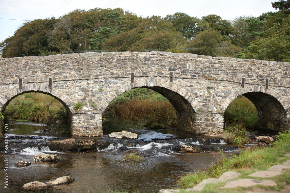Stone bridges near Moretonhampstead a market town, parish and ancient manor in Devon, situated on the north-eastern edge of Dartmoor, within the Dartmoor National Park.