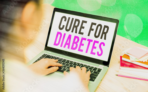 Writing note showing Cure For Diabetes. Business concept for looking for medication through insulindependent Modern gadgets white screen under colorful bokeh background photo