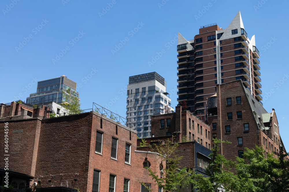 Fototapeta premium Old Brick Buildings and Skyscrapers in Midtown Manhattan of New York City