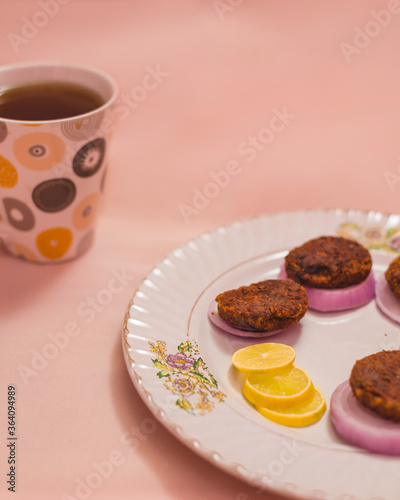 kebabs with onions and a cup of coffee