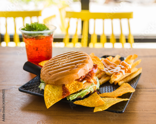 Burger with fries and nachos