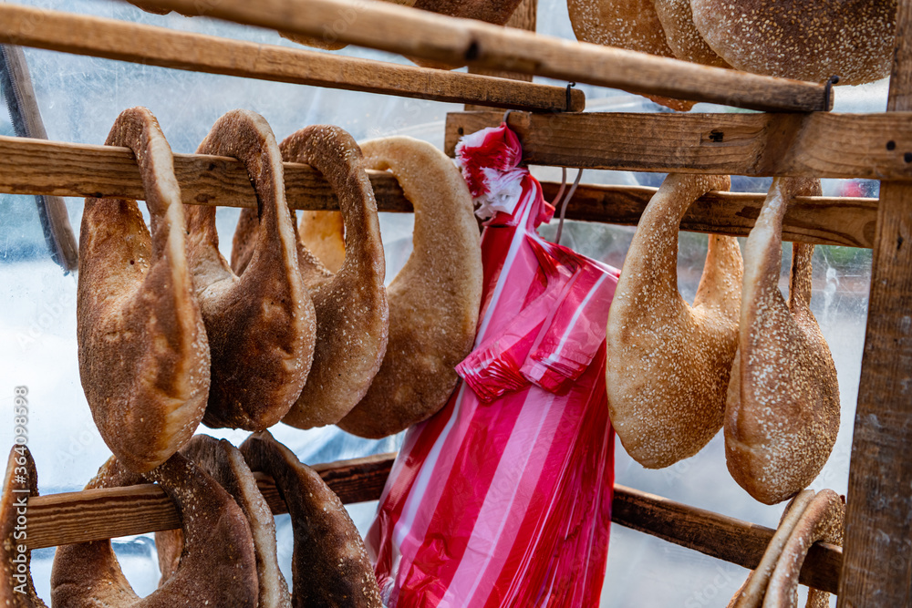 Fototapeta premium Traditional Lebanese Kaak bread for sale. A handbag shaped bread usually sold on the streets