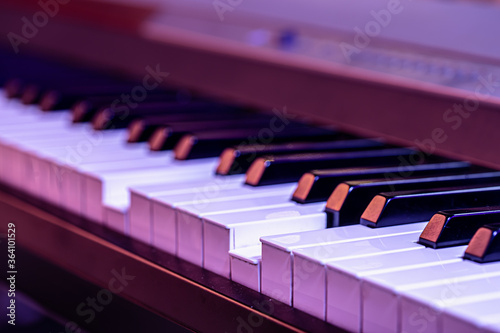 Piano keys on a beautiful colored background.