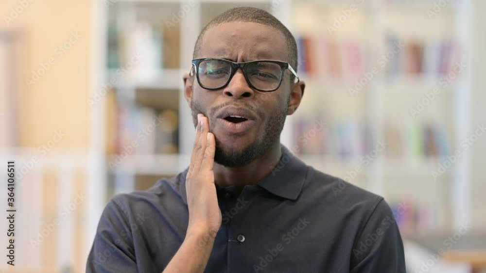 Portrait of Sick Young African Man having Toothache Portrait of Sick Young African Man having Toothache