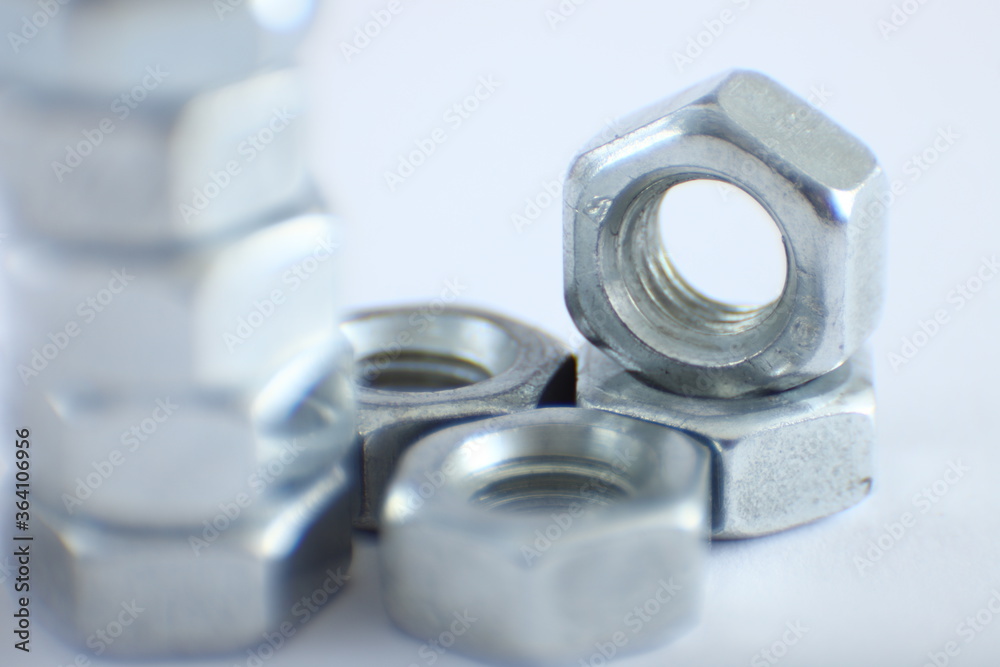 Machine - Nat set,bolt,washer on white background Machine - Nat set,bolt,washer on white background