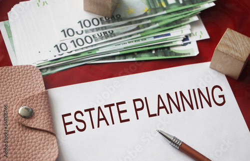 Estate planning words on page, 100 Euro bills , wallet ,pen. RE Business concept photo