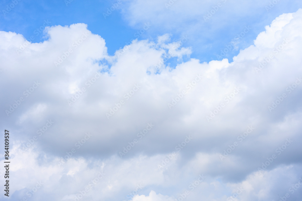 summer clouds on the blue sky