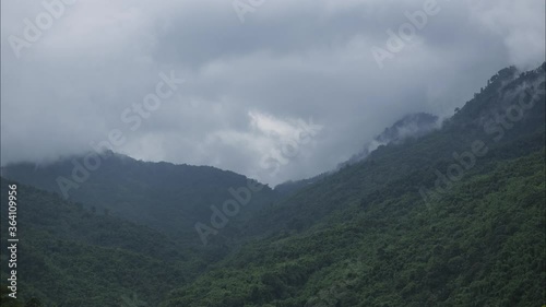 Wallpaper Mural Time-lapse of Cloud Dispersing between two mountains in a Valley with green rain-forest in Manipur, one of the Northeastern states of India shot in 4k Torontodigital.ca