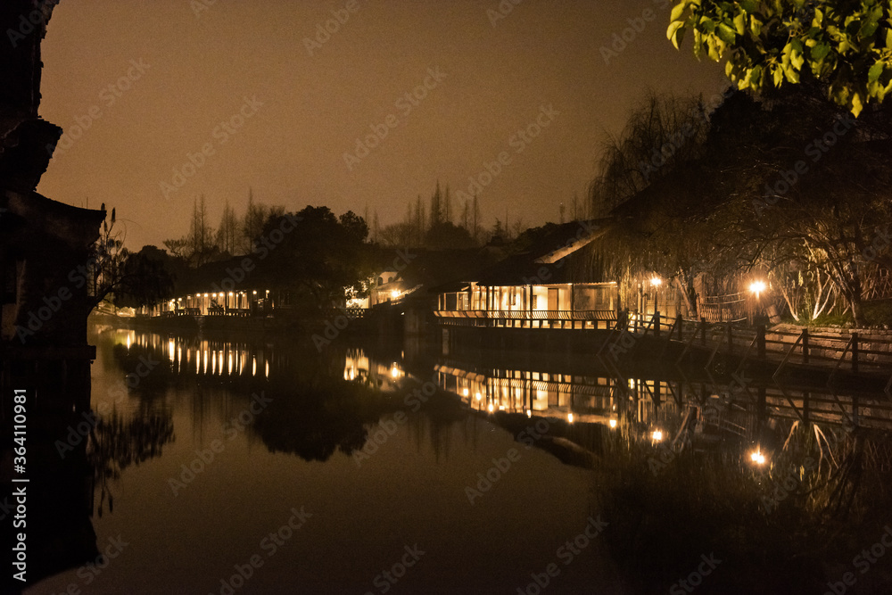 Wuzhen,Tongxiang city,Zhejiang province,Chine.01,21,2018. The night view of ancient town,Wuzhen, is a famous historical,cultural and traditional water town.