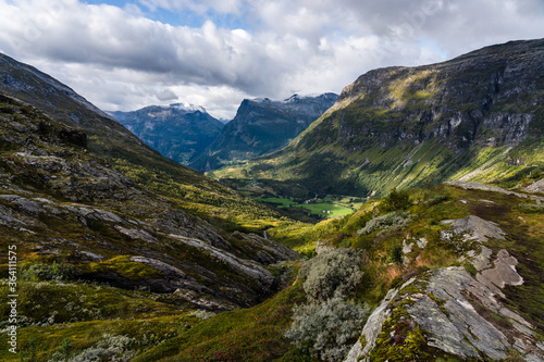 Norwegian valley surrounded by mountains on a summer day