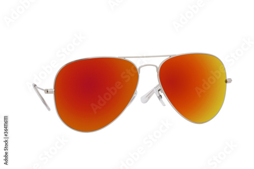 Sunglasses with a silver frame and red lens isolated on white background.