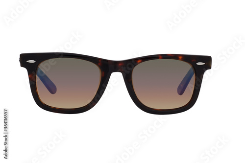 Sunglasses with a black-brown plastic frame and brown lenses isolated on white background.