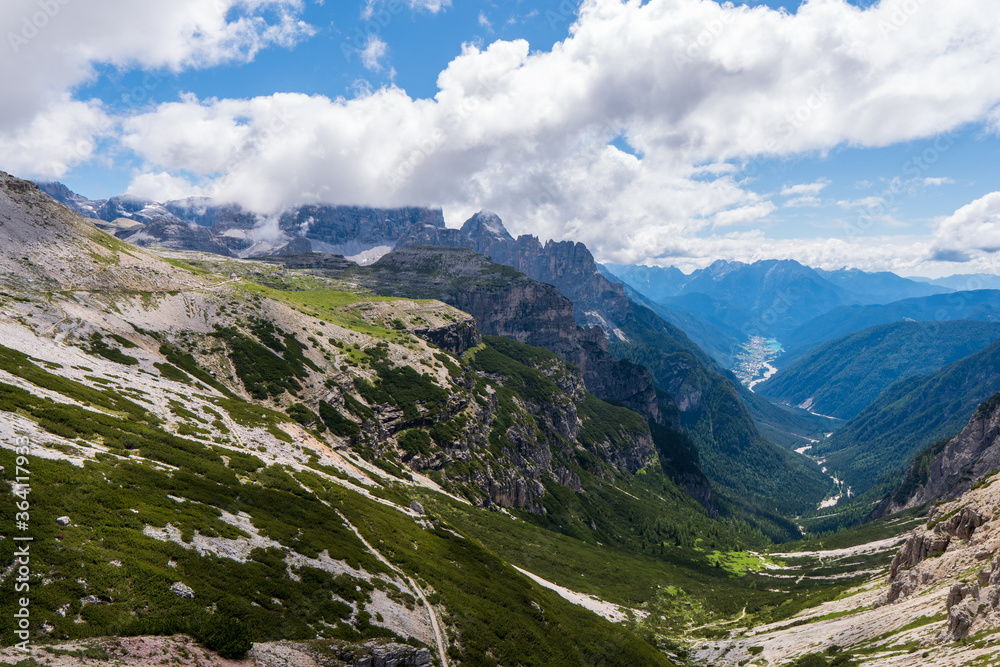 Fantastic views down the Dolomites mountain valley at the start of Tre Cime di Lavaredo loop hike in Parco Naturale Tre Cime, South Tyrol, Italy