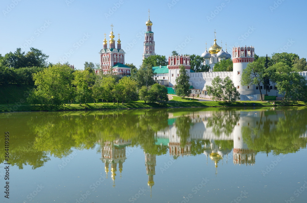 Summer view of the Novodevichy monastery from the pond. Moscow, Russia