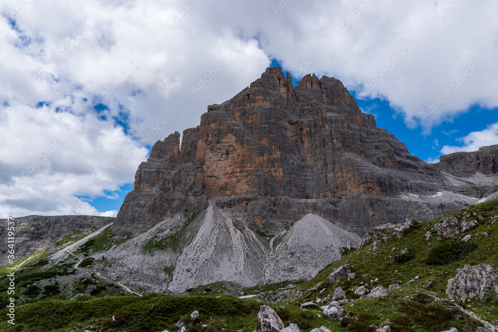 Amazing rocky mountains covered with clouds, Tre Cime di Lavaredo park, Dolomites, Italy