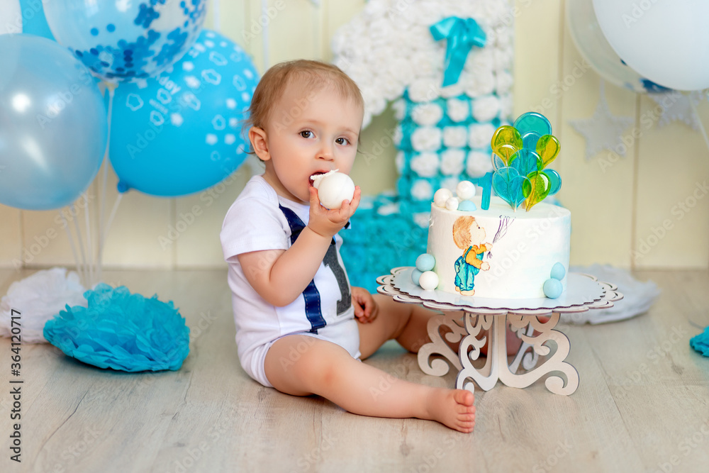 baby boy eating his cake with his hands, baby 1 year old, happy childhood, children's birthday baby boy eating his cake with his hands, baby 1 year old, happy childhood, children's birthday