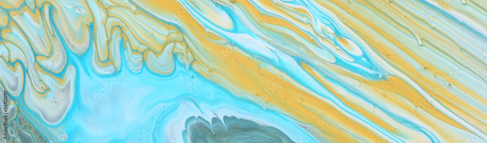 Fototapeta premium art photography of abstract marbleized effect background. Blue and gold creative colors. Beautiful paint.