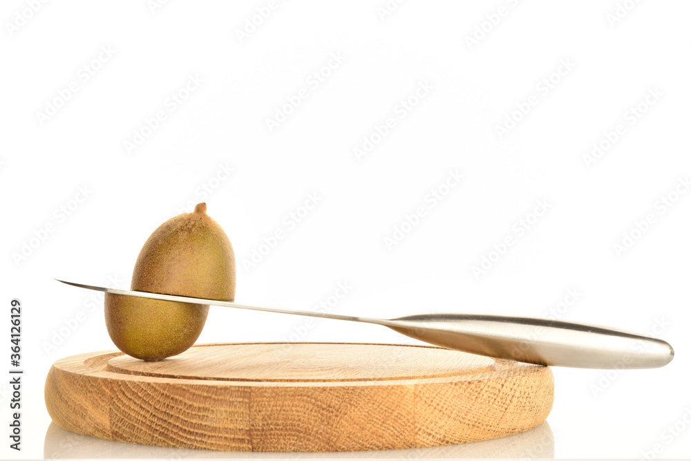 Ripe sweet organic kiwi, close-up, isolated on white.