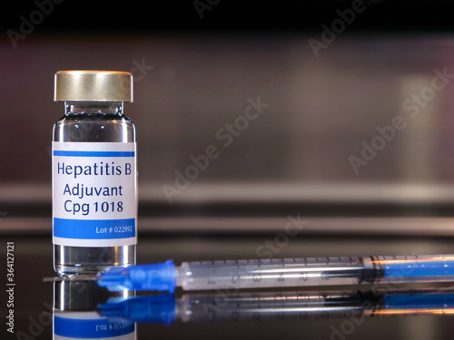 Foto Hepatitis B adjuvant Cpg 1018 with syringe and copy space