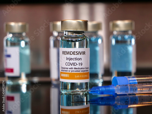 Vial of remdesivir with syringe for covid 19 coronavirus photo