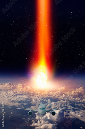 Attack of the asteroid  meteor  on the Earth with airplane in the sky  Elements of this image furnished by NASA