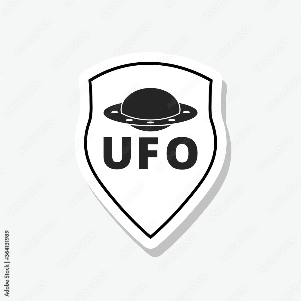 UFO and shield logo combination sticker isolated on gray background UFO and shield logo combination sticker isolated on gray background