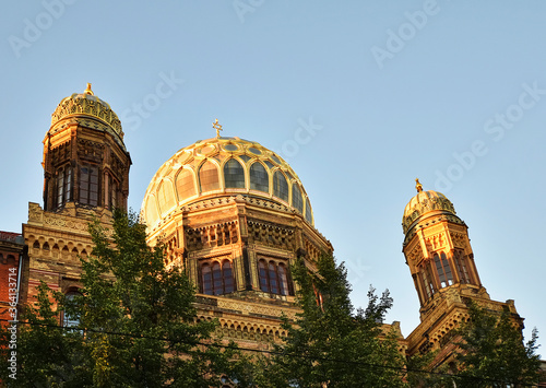 Canvas Print View to the dome and the small towers of New Synagogue in the downtown of Berlin in the evening sun