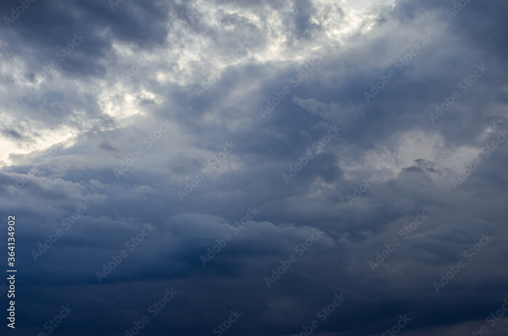 Dark blue sky with clouds