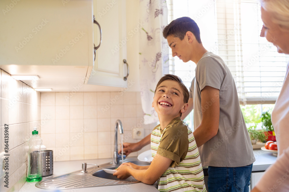 custom made wallpaper toronto digitalTwo boys washing the dishes in the kitchen sink
