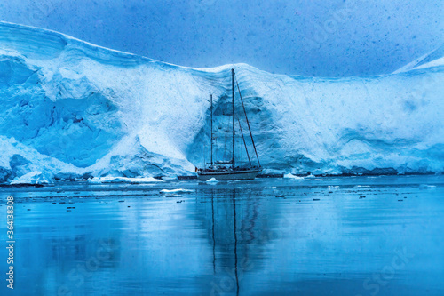 Sailboat Icebergs Glacier Snow Mountains Paradise Bay Skintorp Cove Antarctica photo