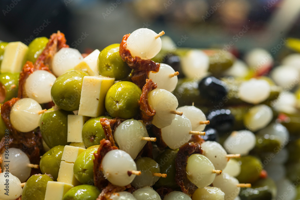 Fototapeta premium Tapas for sale in Madrid San Miguel market. Spain.