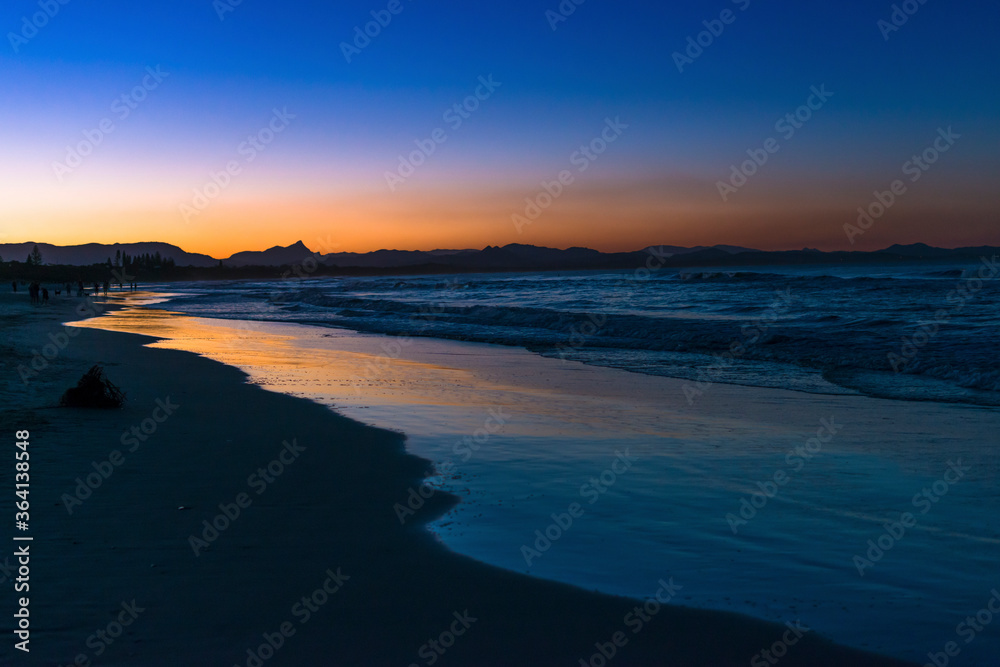 Belongil Beach at Byron Bay at dusk. Queensland. Australia. Belongil Beach at Byron Bay at dusk. Queensland. Australia.