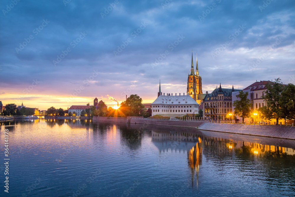 Wroclaw, Poland. View of Cathedral Island (Ostrow Tumski) and Odra river on beautiful sunset