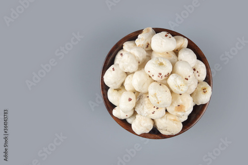 Roasted Makhana or Lotus sedds in bowl photo