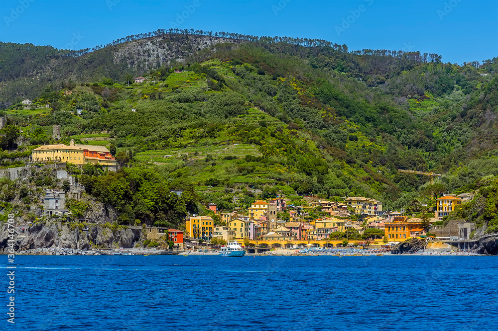 A view from the sea toward the old district of Monterosso, Italy in the summertime
