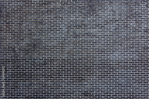 horizontal part of black painted brick wall