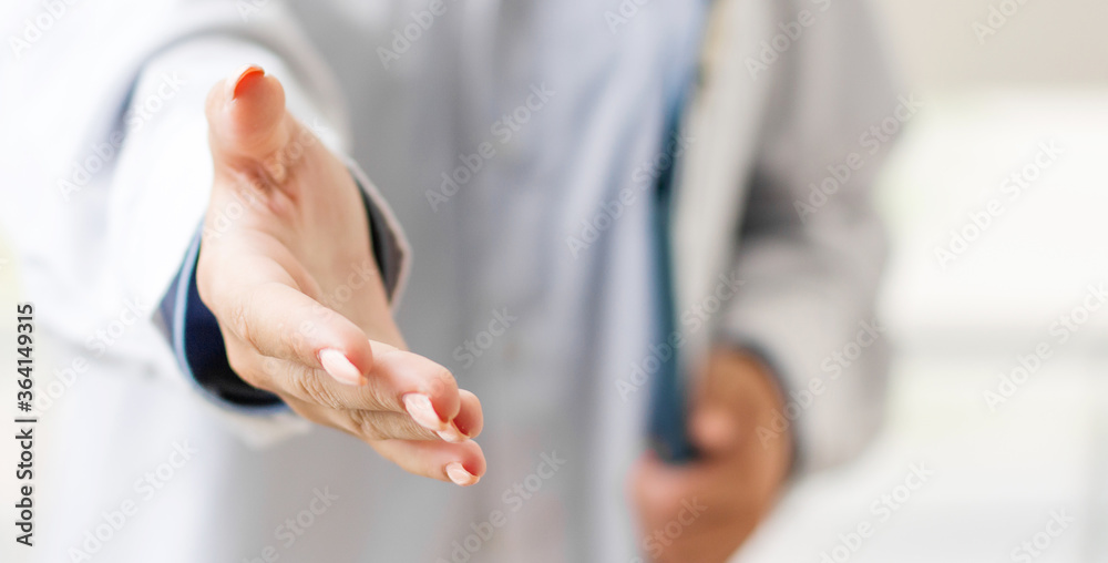 Close up of male doctor holding something in his hand