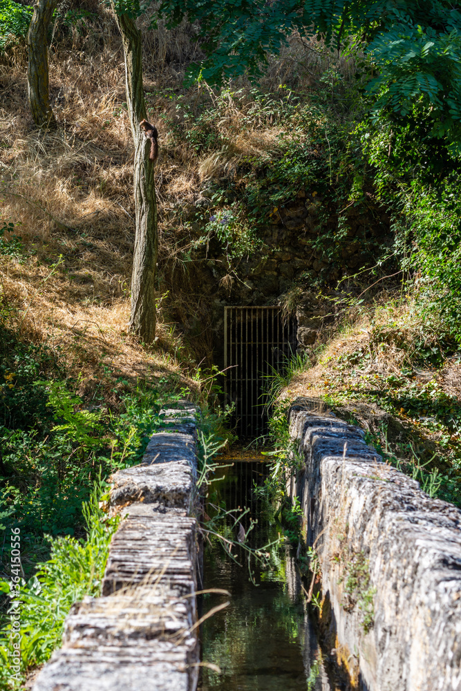 Historical Arab ditch Aynadamar between the Granada towns of Alfacar and Víznar Historical Arab ditch Aynadamar between the Granada towns of Alfacar and Víznar