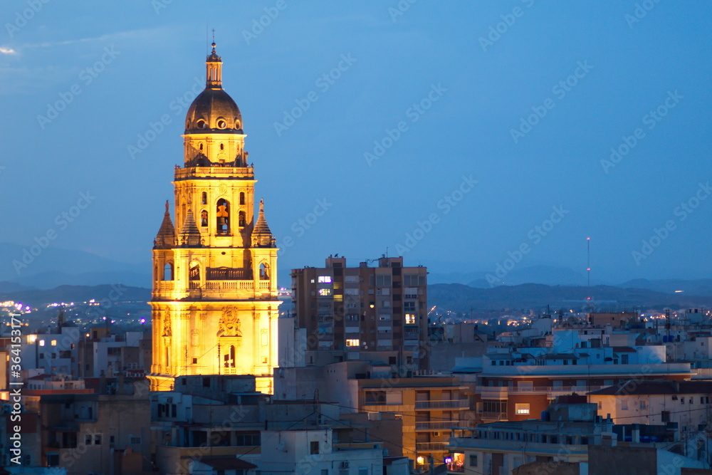 Fototapeta premium illuminated tower of the cathedral of murcia