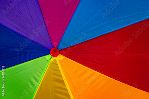Colorful parts of umbrella. Autumn background.