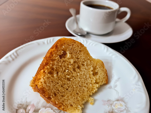 Delicious slice of orange cake with orange juice topping  perfect with coffee  tea  milk or juice at any time of the day.