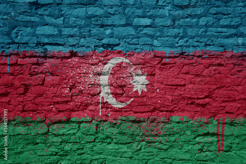 painted big national flag of azerbaijan on a massive old brick wall