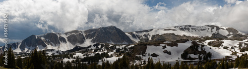 Wyoming's Snowy Range under storm clouds.