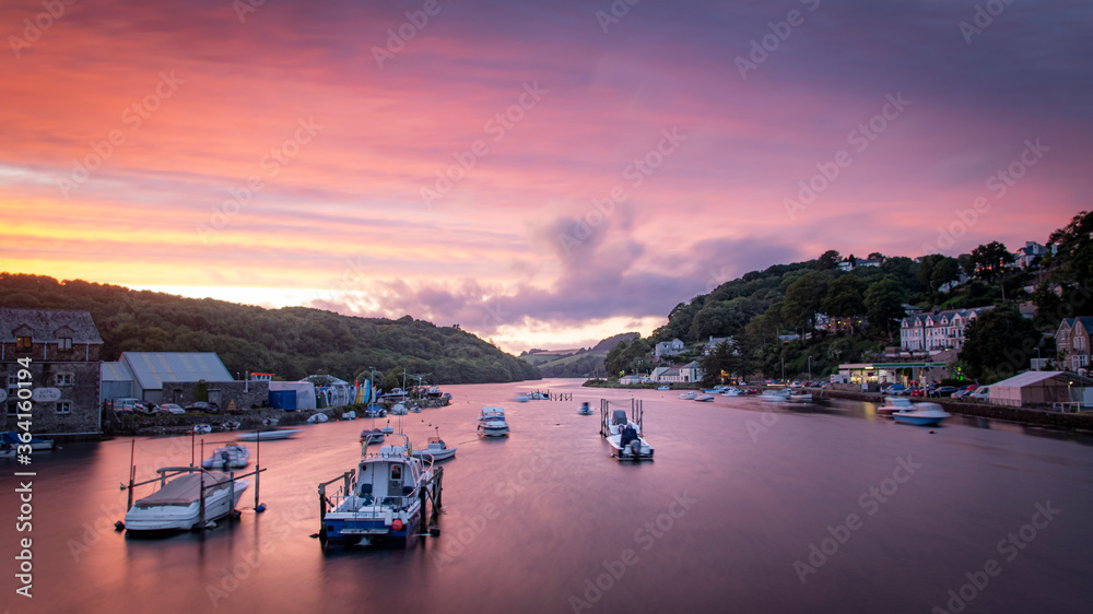 Fototapeta premium Red Sunset over Looe harbour, cornwall, South England