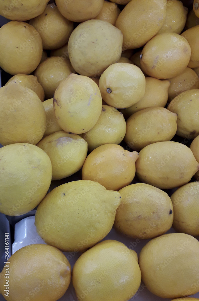 Fresh lemon orange fruit sold in the market Fresh lemon orange fruit sold in the market