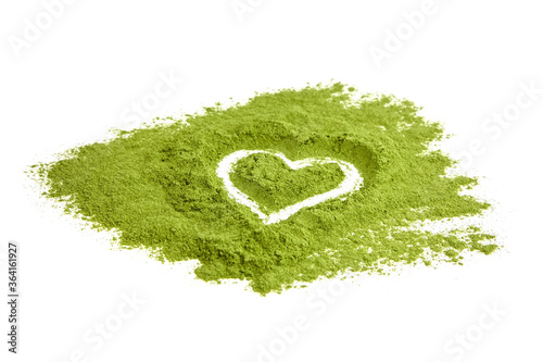 Freeze dried wheatgrass powder heart isolated on white background.